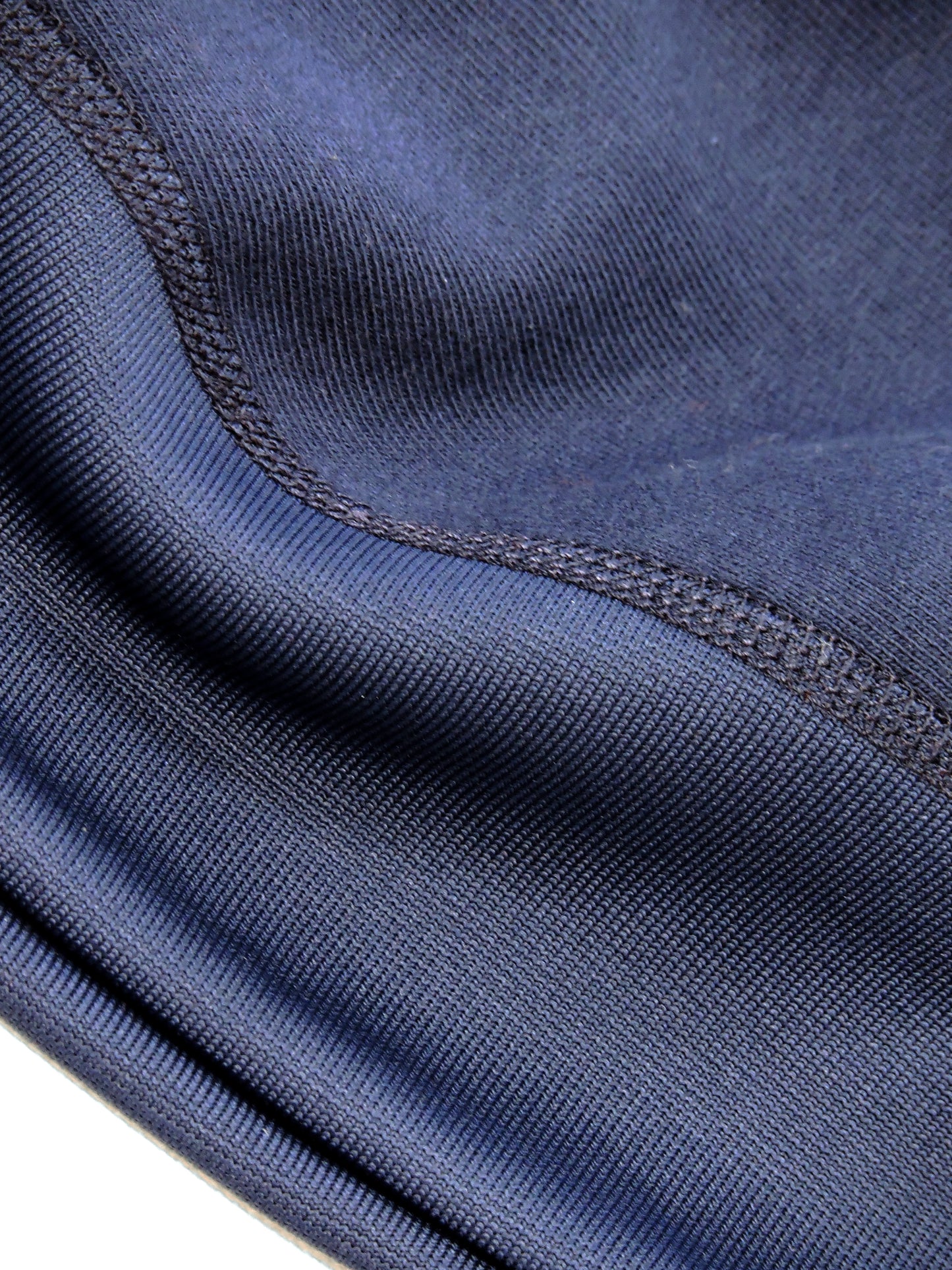 Close up of the knitted seam near waistband