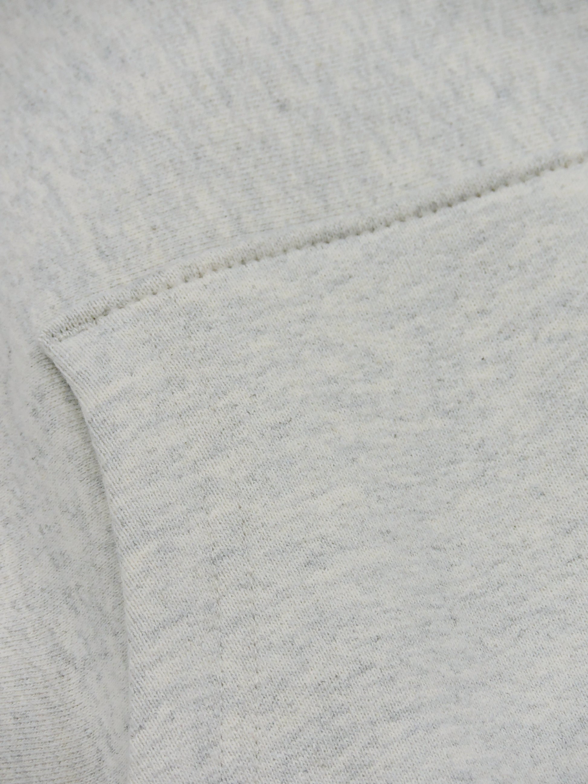 Close up of kangaroo pouch of sweater