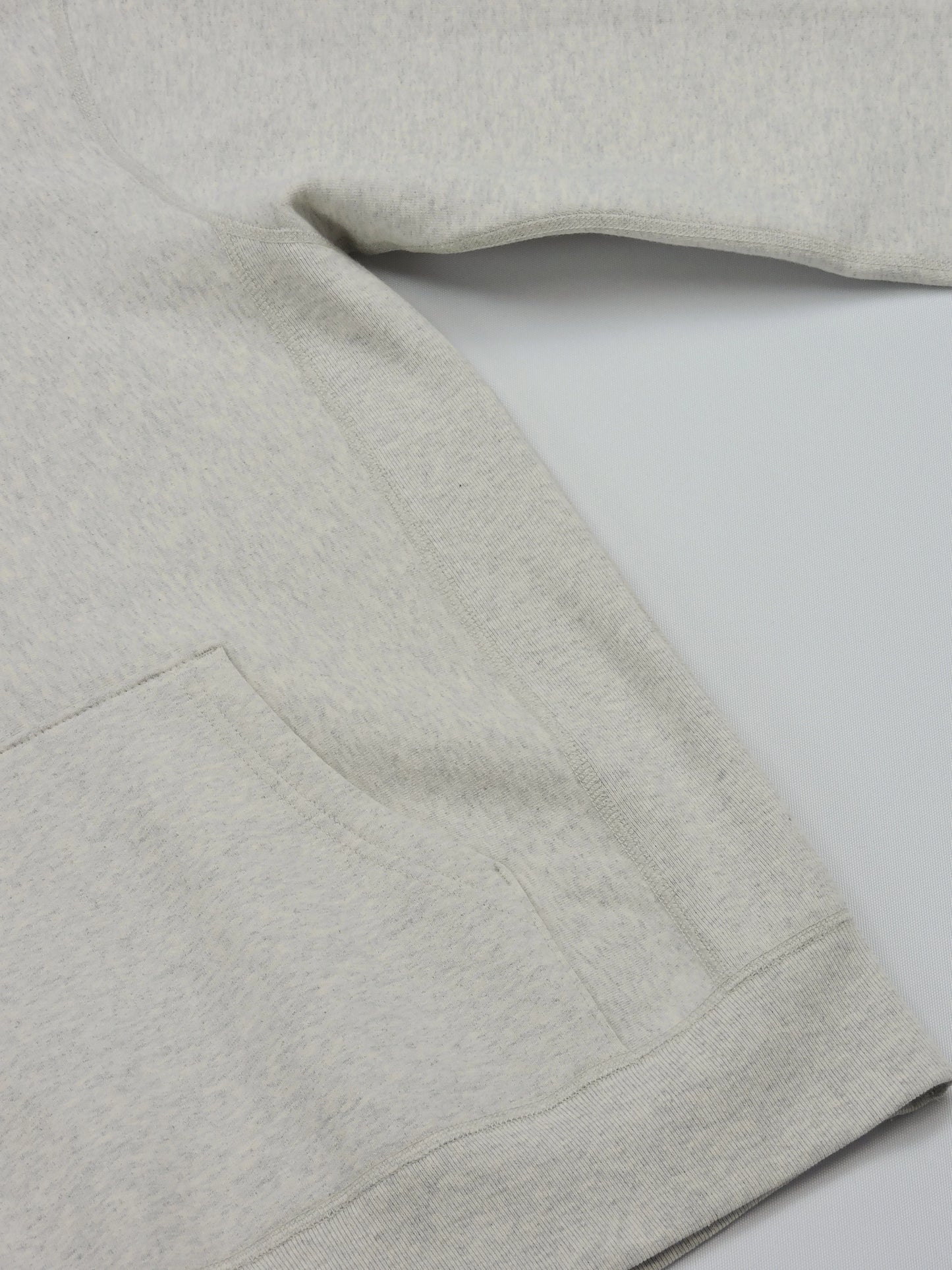 Shot showing sleeve, pouch, and cotton fleece fabric