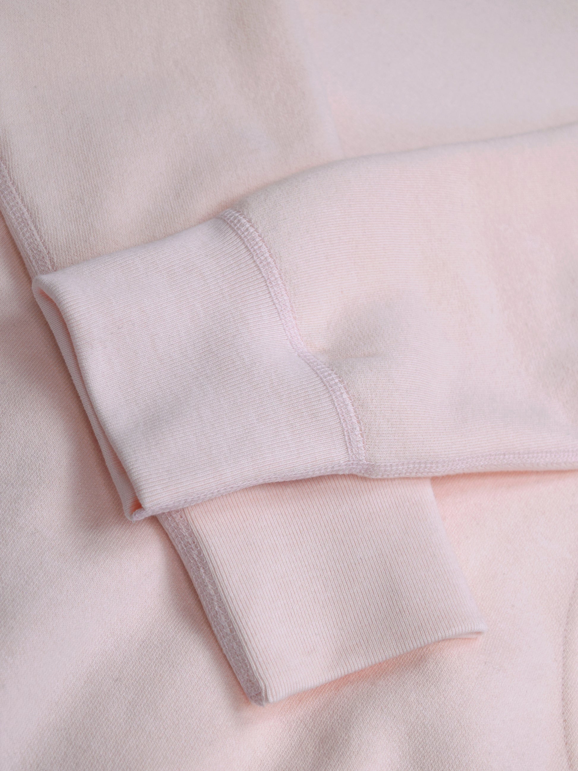 Close of Sleeves of Pale Pink Hoodie