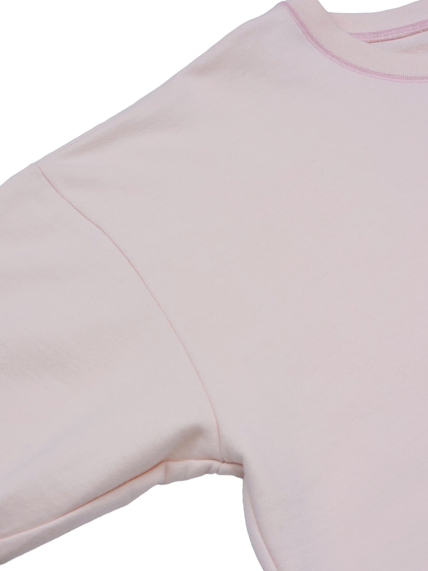 Sweater's fitted shoulder and sleeves