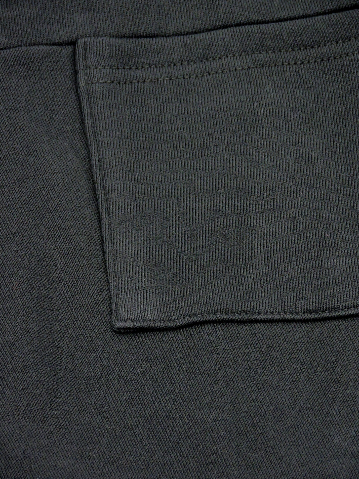 Close up of the back pocket and french terry material