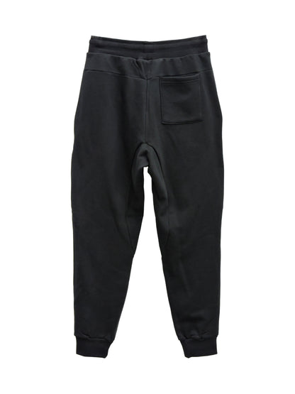 Back of black terry jogger with one rear pocket.