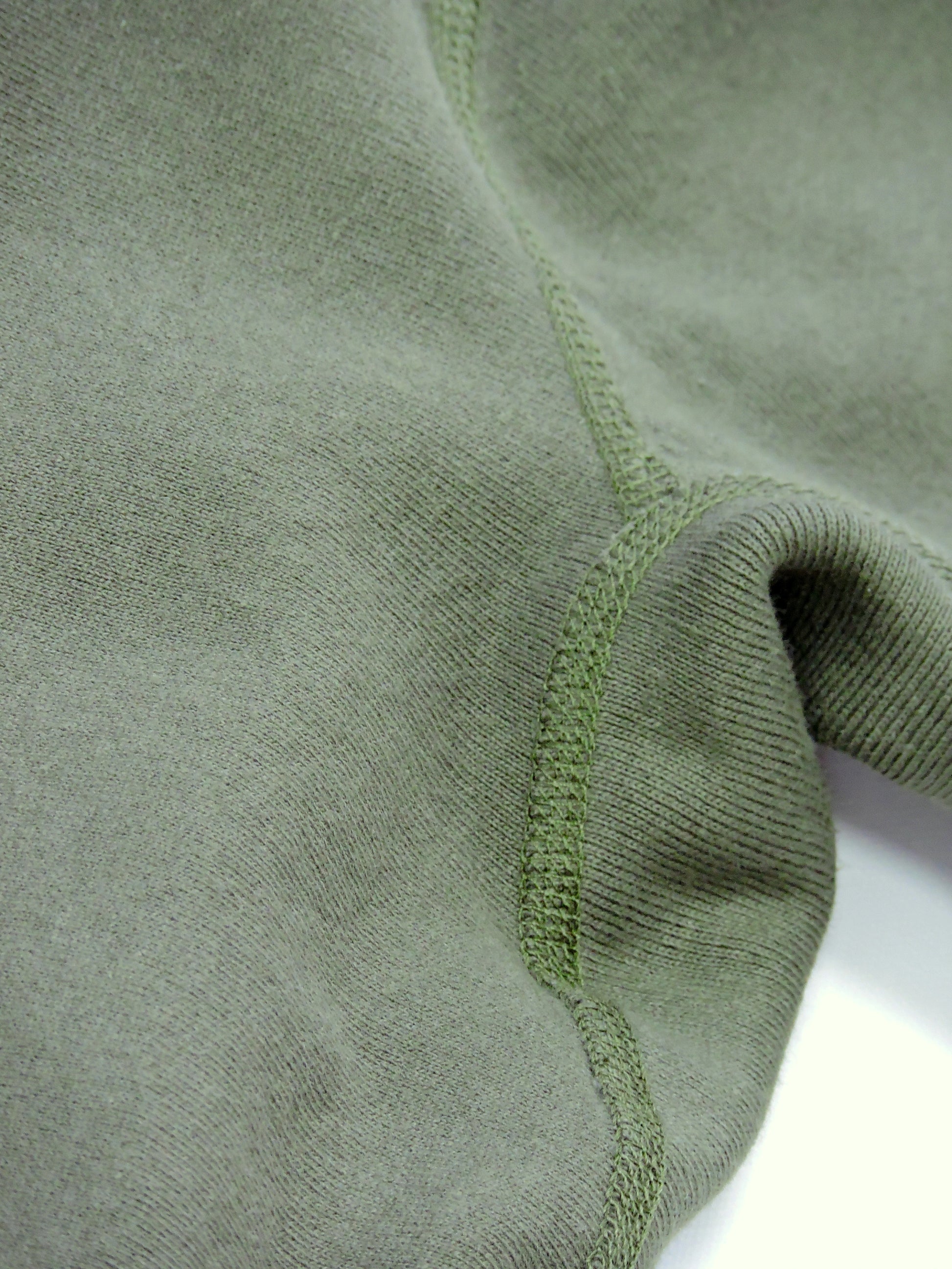 Close up of Knitted Inseams for Fleece Crewneck