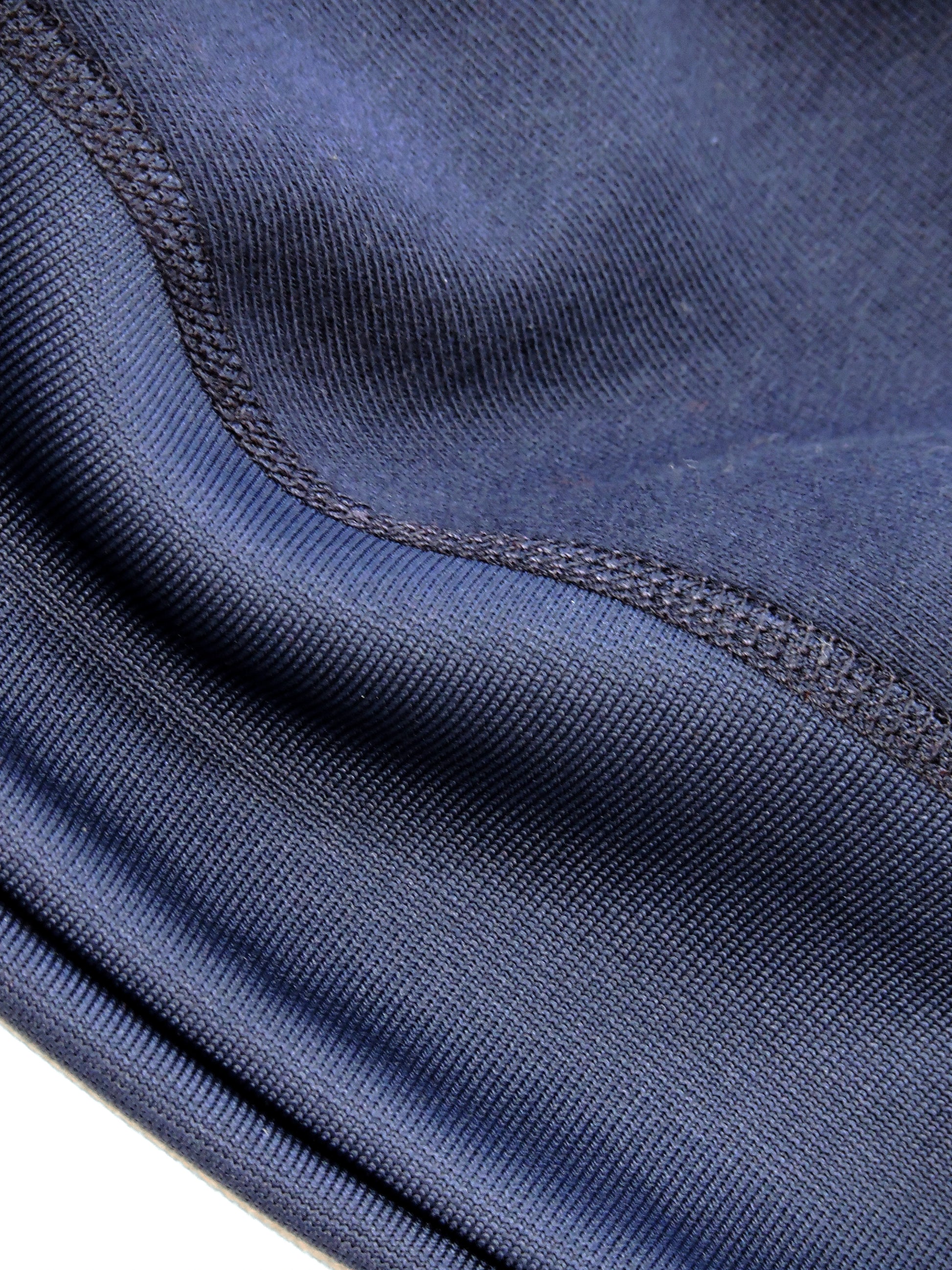 Close up of the knitted seam near waistband 