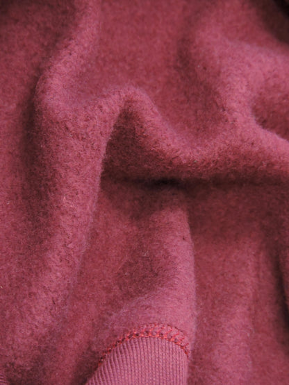 Close up of soft fleece interior of sweater.