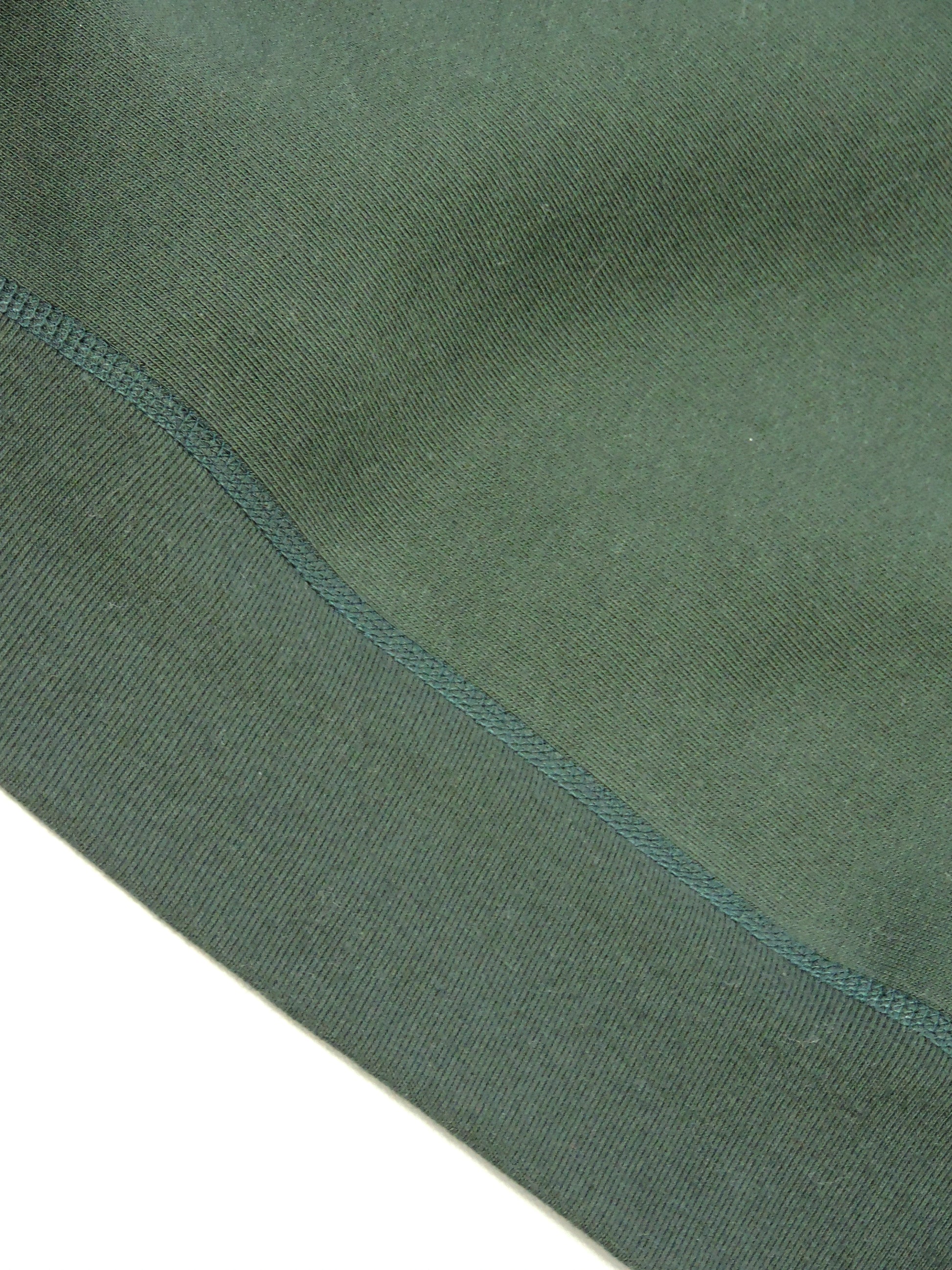Close up of knitted seam above waist.