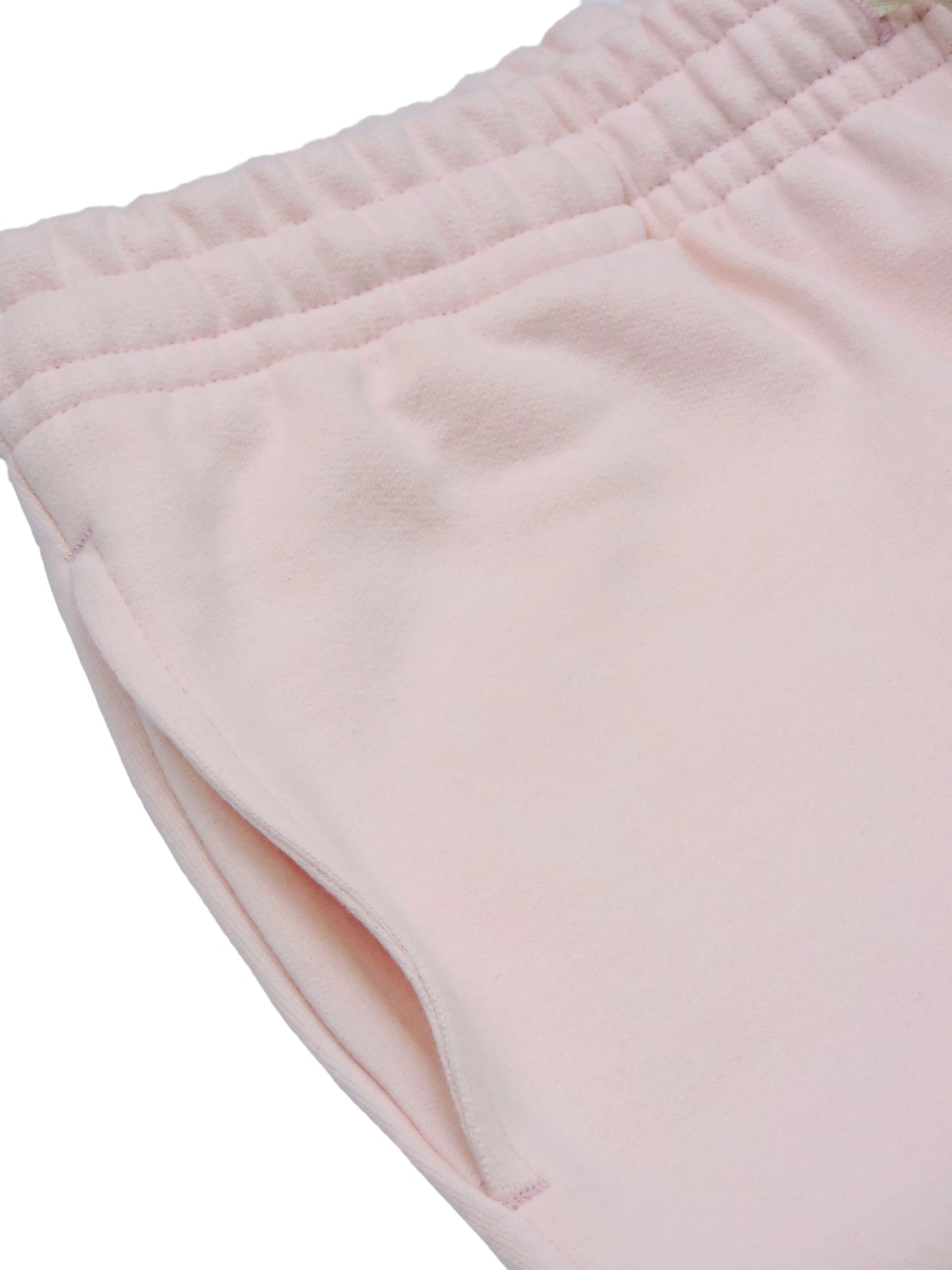 Side pocket of pink mini short