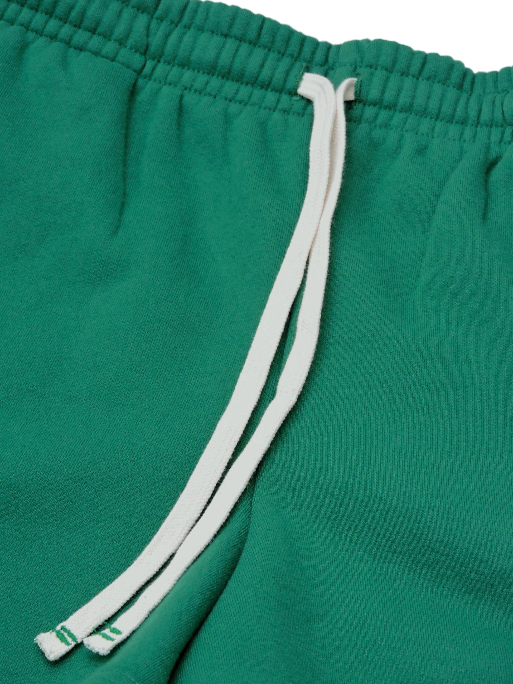 Close up of white drawstrings and waistband
