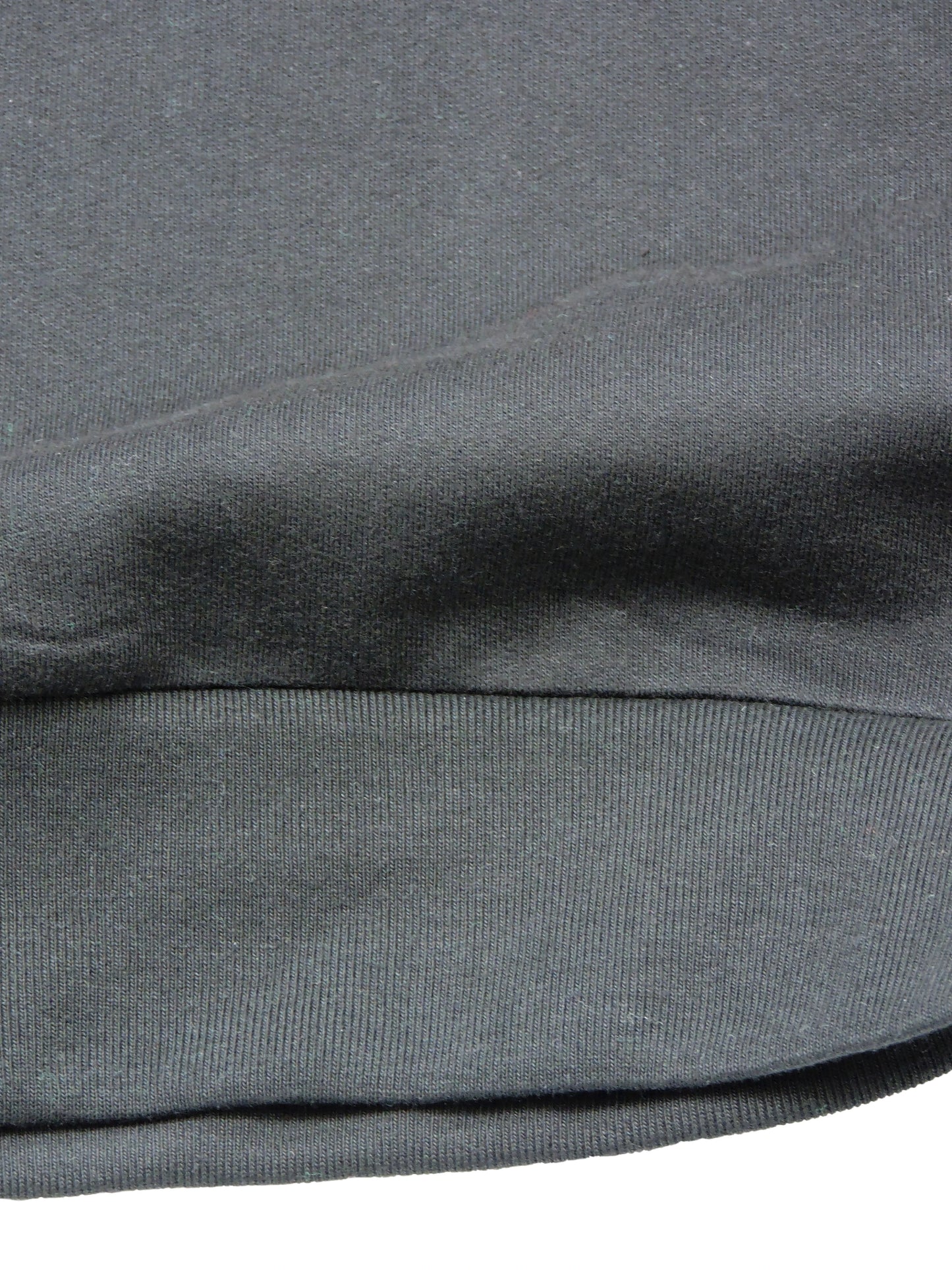 Close up of material and waist ribbing