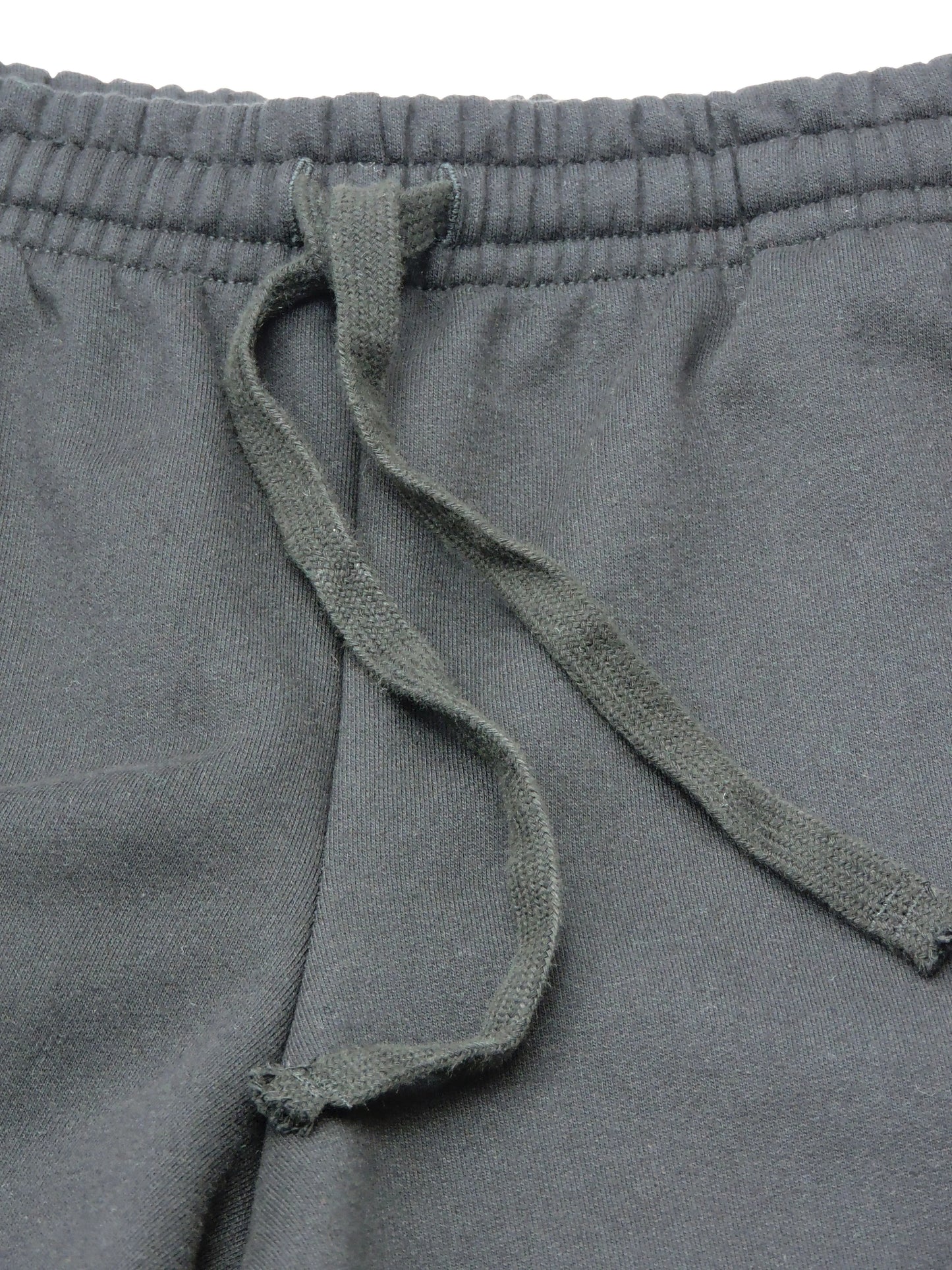 Close up of drawstrings and organic cotton fleece material