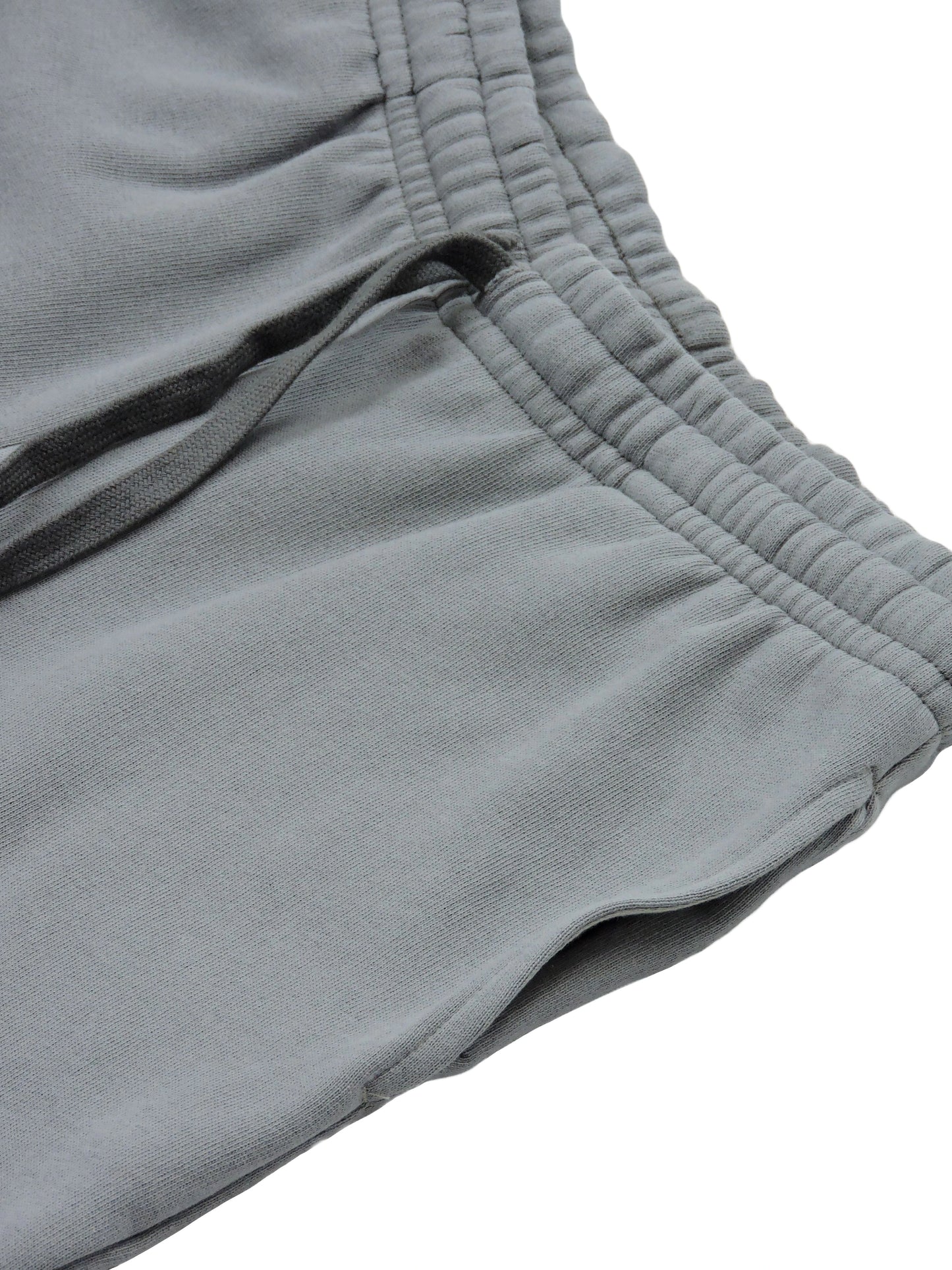 Side Pockets and Drawstrings of Pebble Grey Longshorts