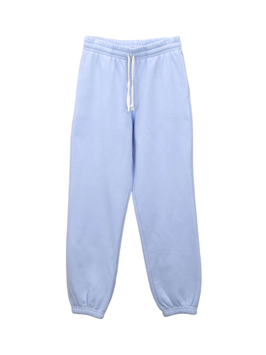 Blue cotton sweatpants with elastic waistband and drawstring, featuring two side pockets and ribbed ankle cuffs for a comfortable and stylish fit.